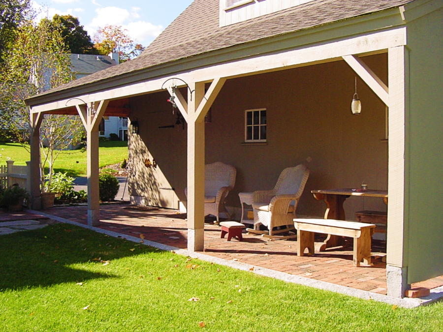 8' Open Lean to Natural Wood Barn with a Green Metal Roof