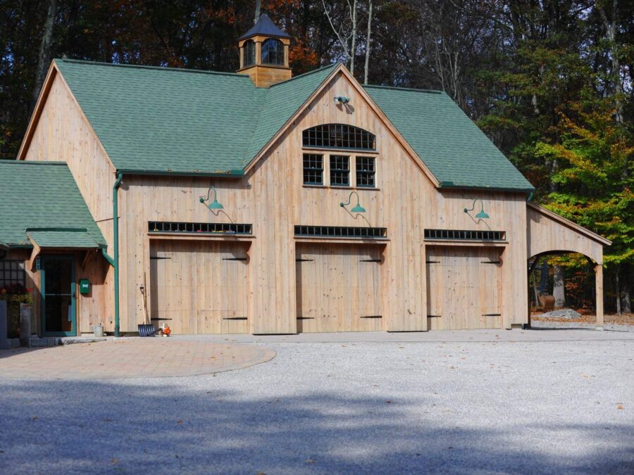 Natural Wood Barn with a Green Metal Roof