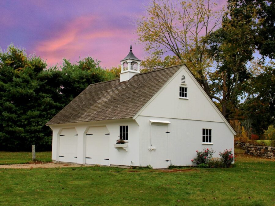 White New England Carriage House with cupola sunset photo