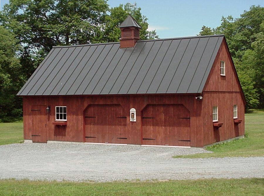 Brown Carriage House with metal roof