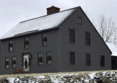 Classic style Saltbox home with charcoal exterior