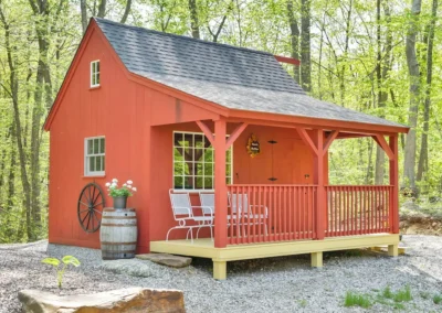 Red Country Cabin with a porch